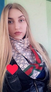 Оля